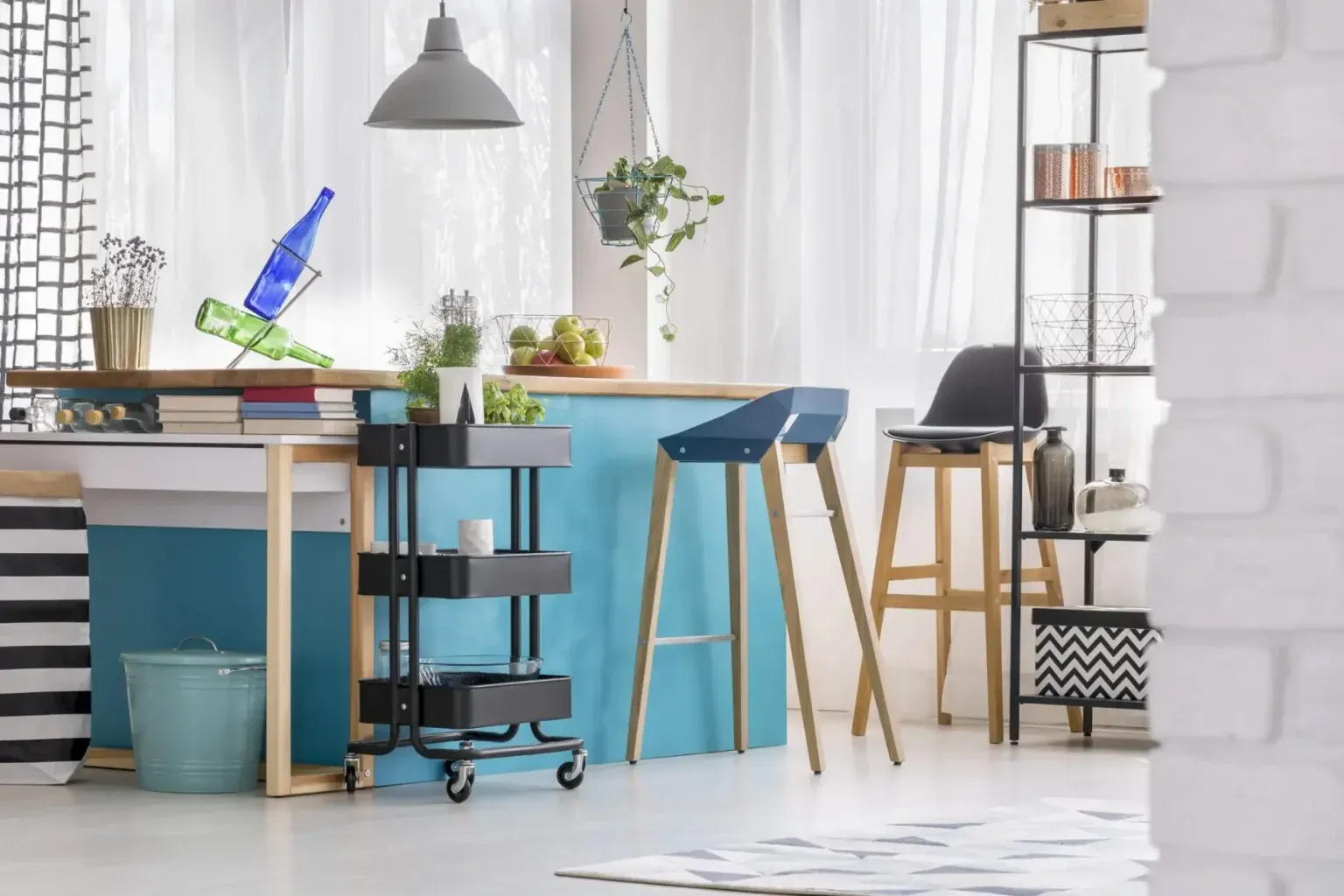 cabinet iq bright home study corner with a blue kitchen island