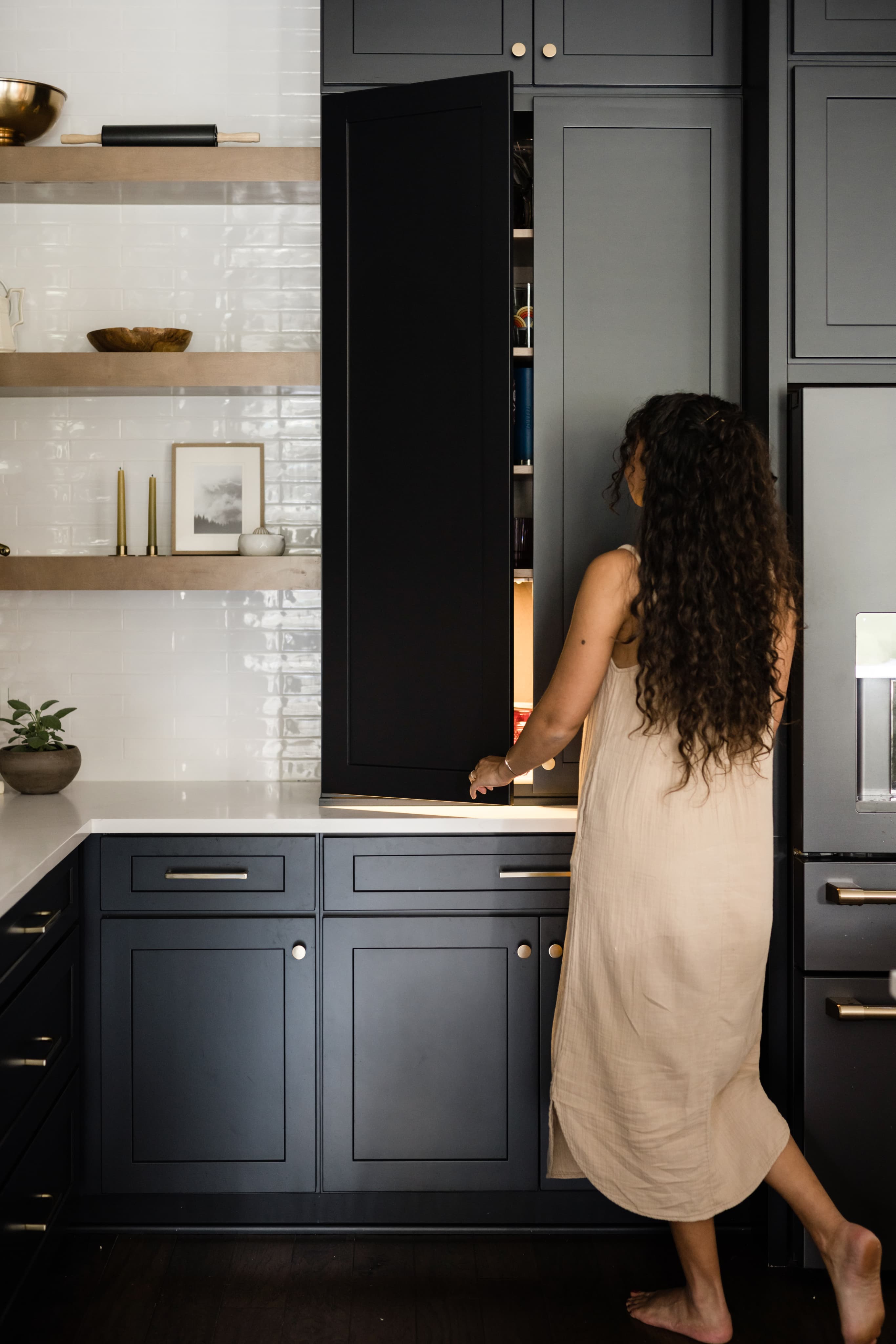 Cabinet IQ designer reviewing cabinet and countertop samples with a client