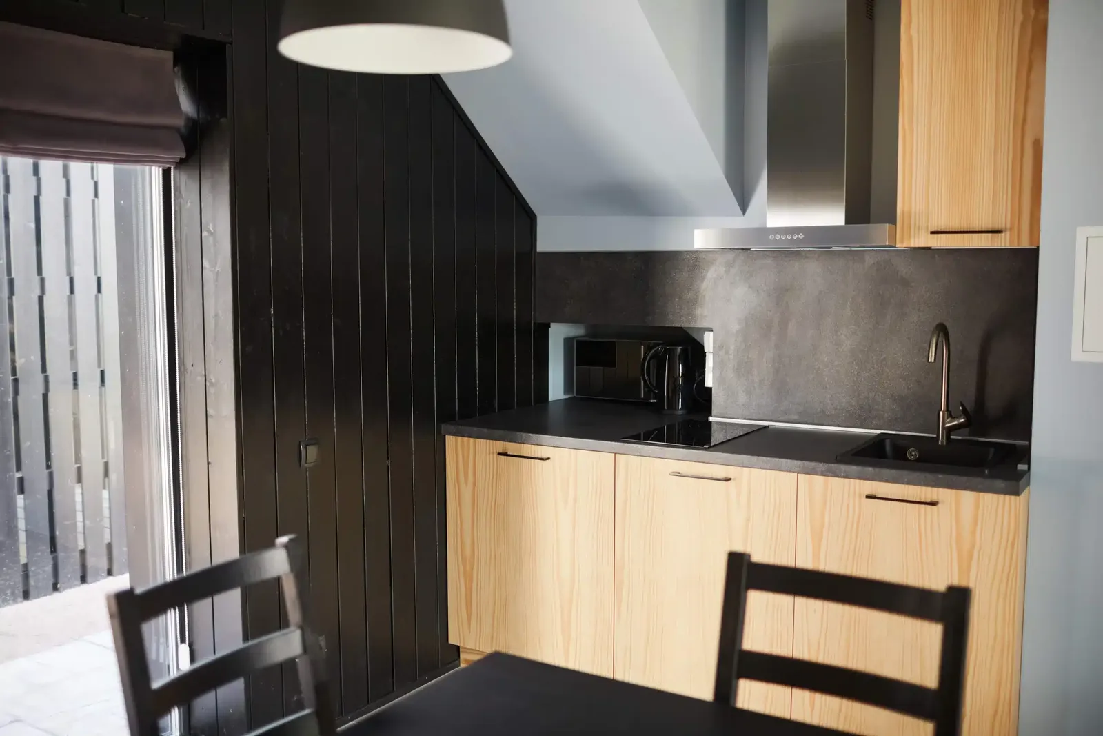 Cabinet IQ - wood kitchen cabinets with black marble countertops