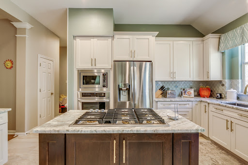 Modern kitchen with white framed cabinets, Cabinet IQ