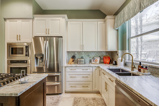 Modern kitchen with white framed cabinets, Cabinet IQ